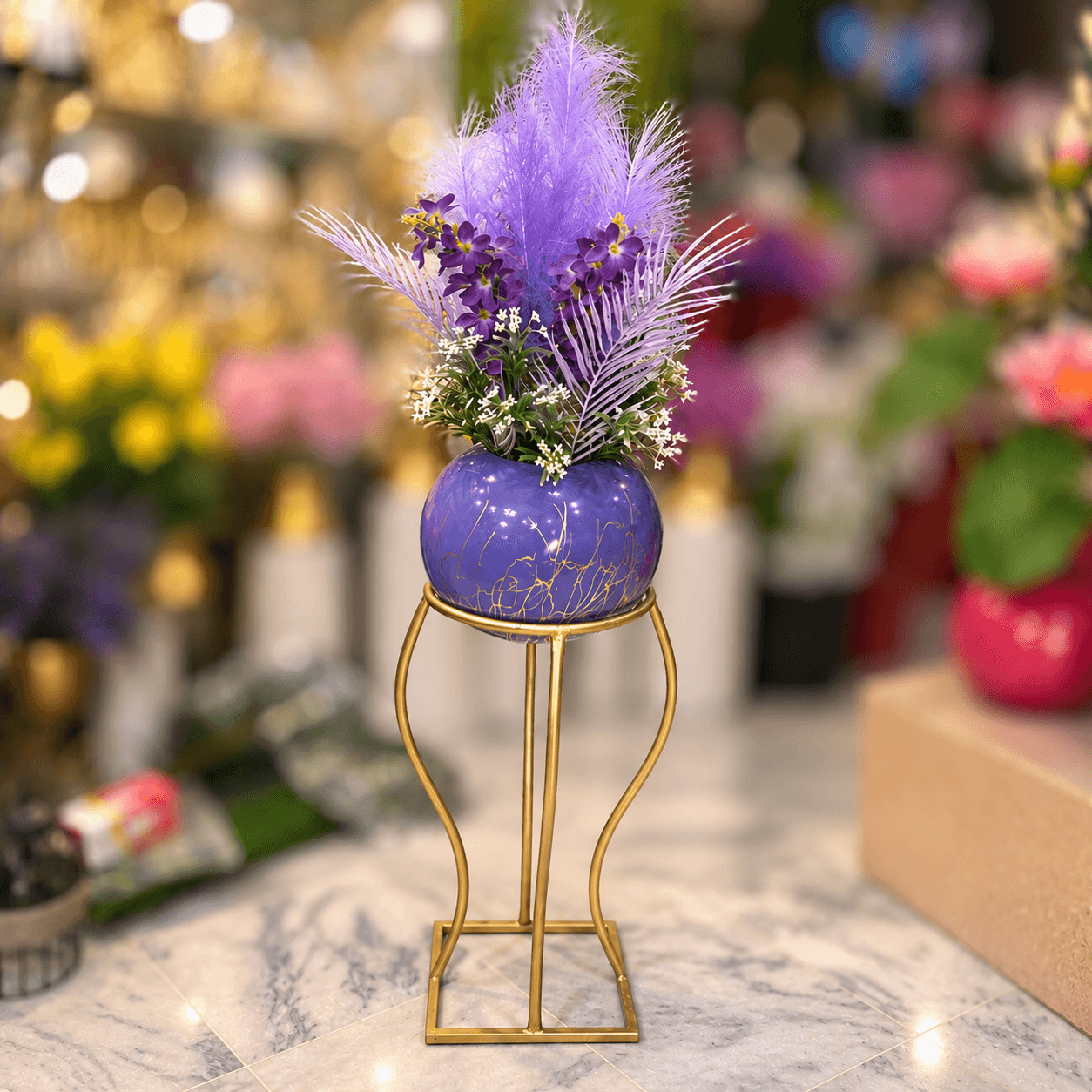Purple Floral Arrangement in Chalk Bowl with Gold Metal Stand